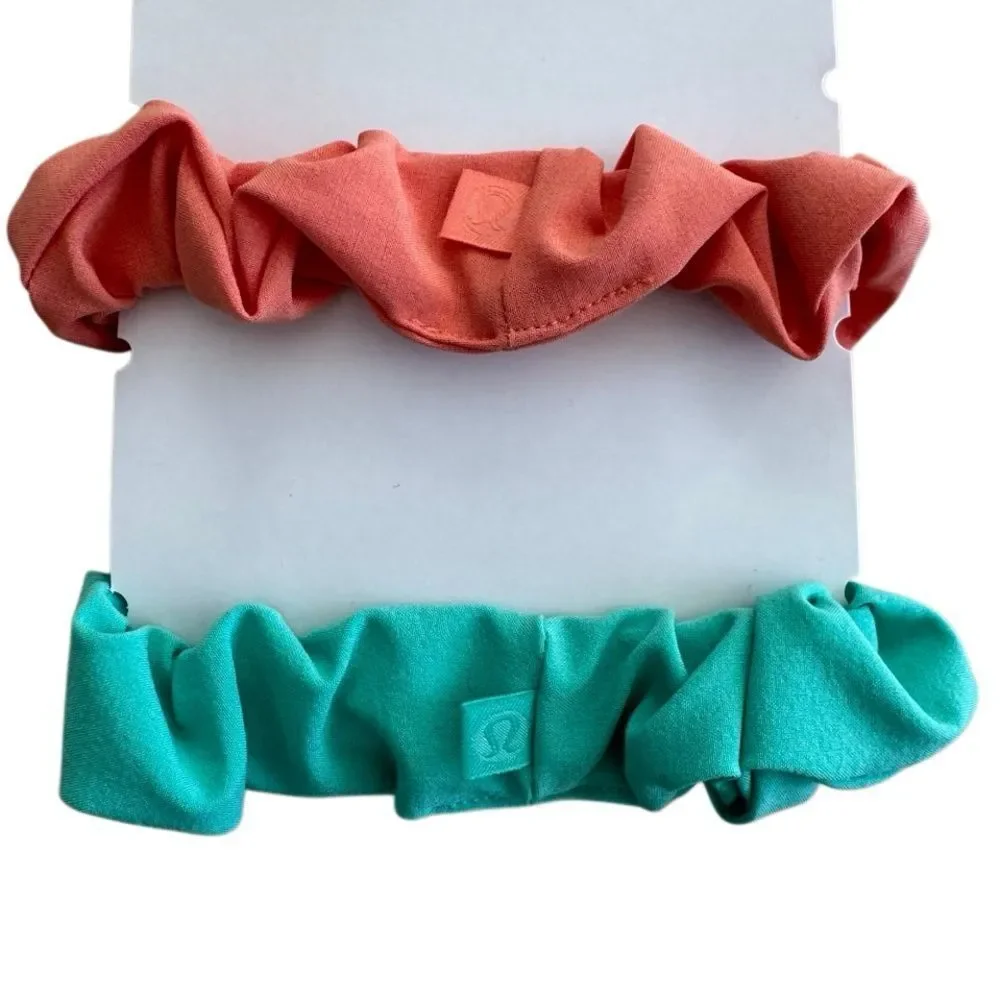 2 Lululemon Uplifting Scrunchies: Wander Teal and Coral Kiss NWOT